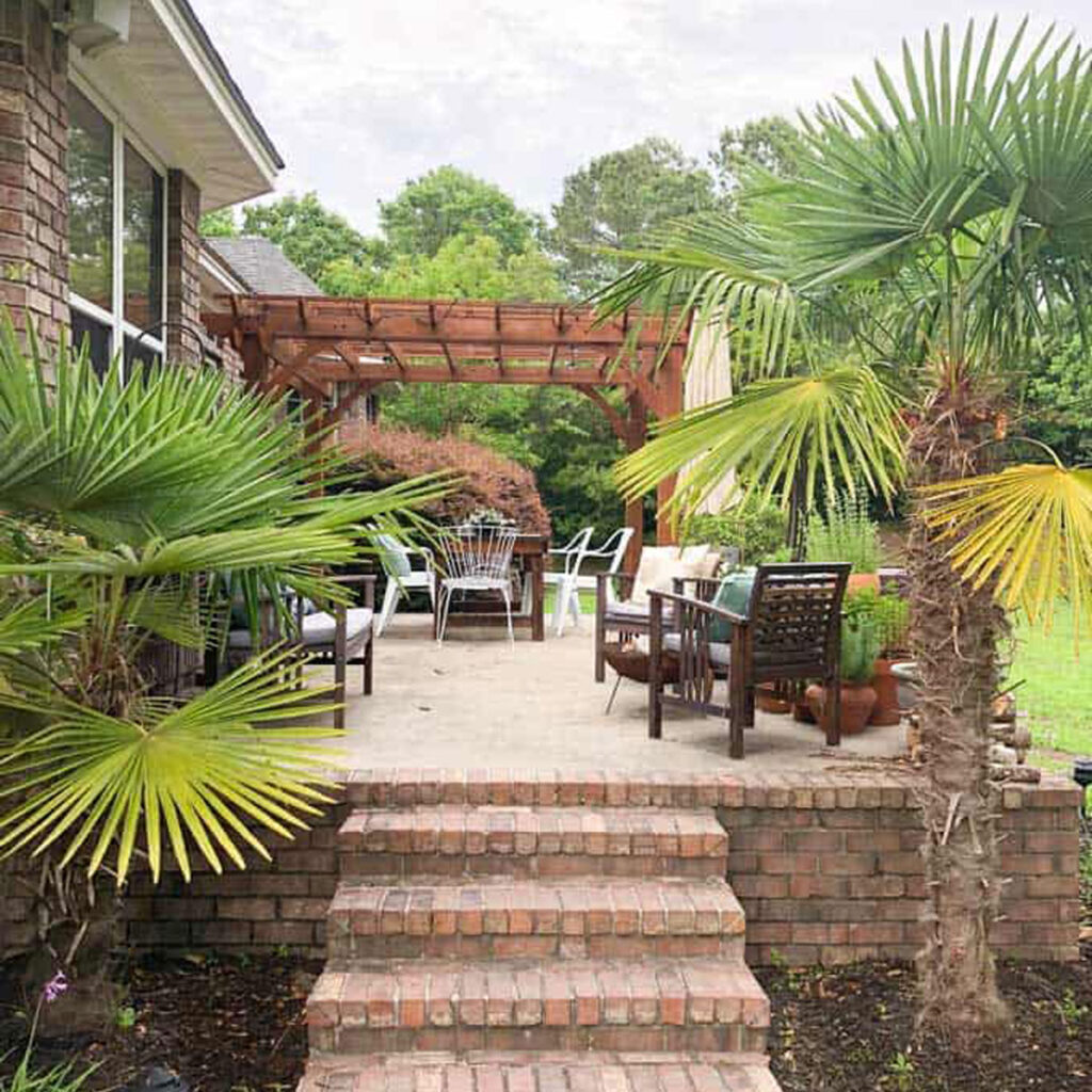 raised porch with pergola and seating area