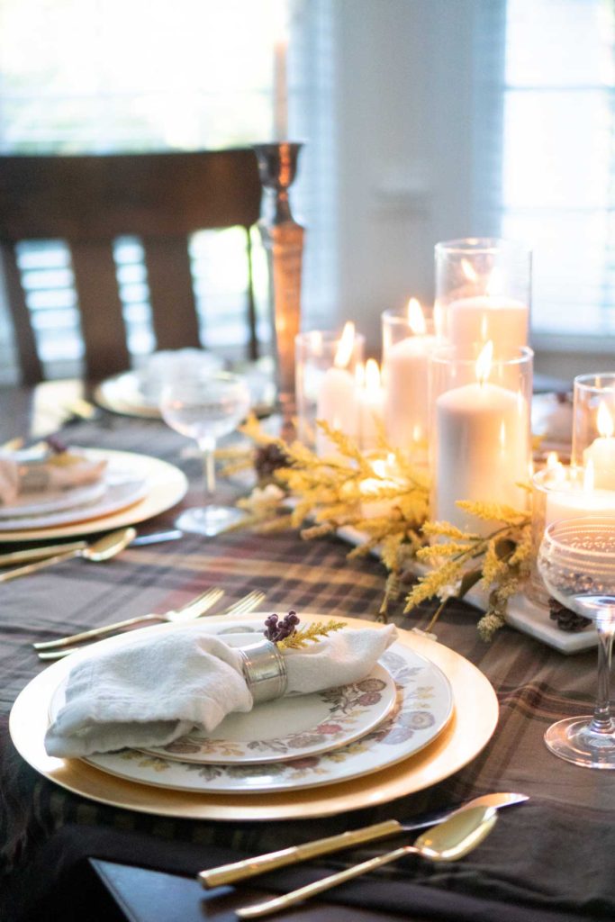 fall table setting with plaid table throw