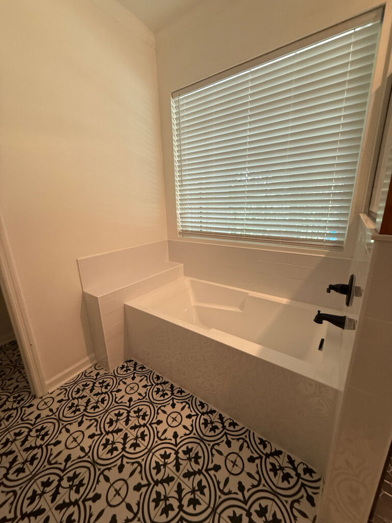 tub and graphic floor tile