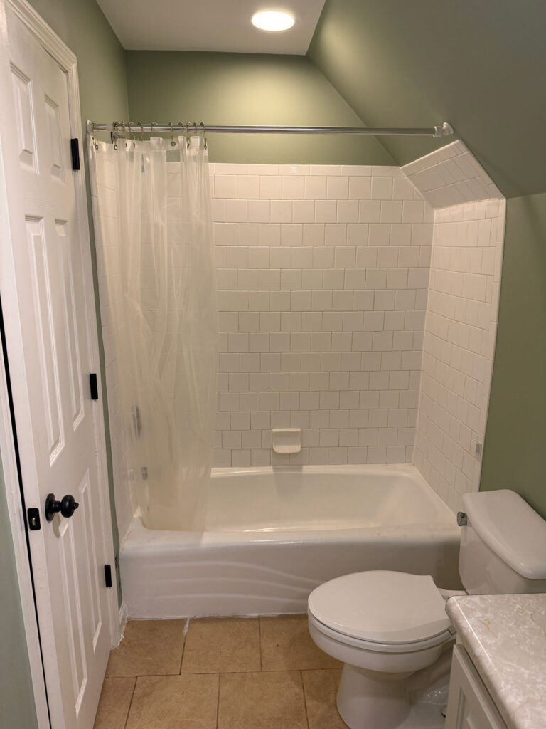 90s bathtub with shower