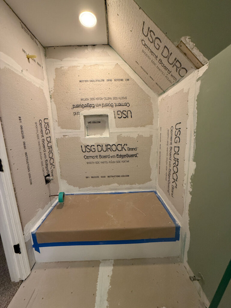 bathtub covered with protective paper for renovation