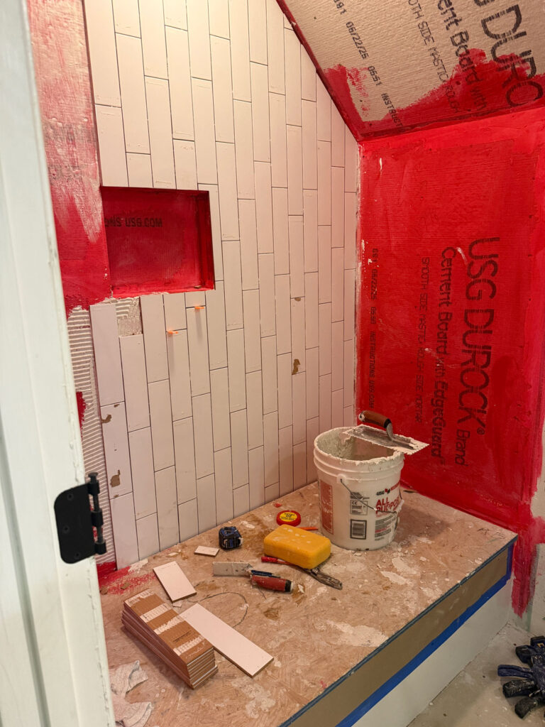 process shot of shower tiling