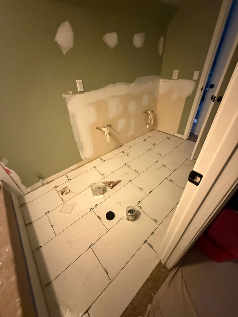 bathroom tile being installed