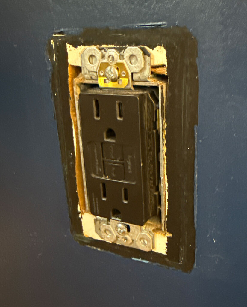 black outlet on blue island side