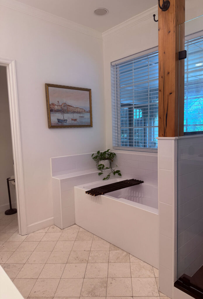 soaking bathtub with wooden tray