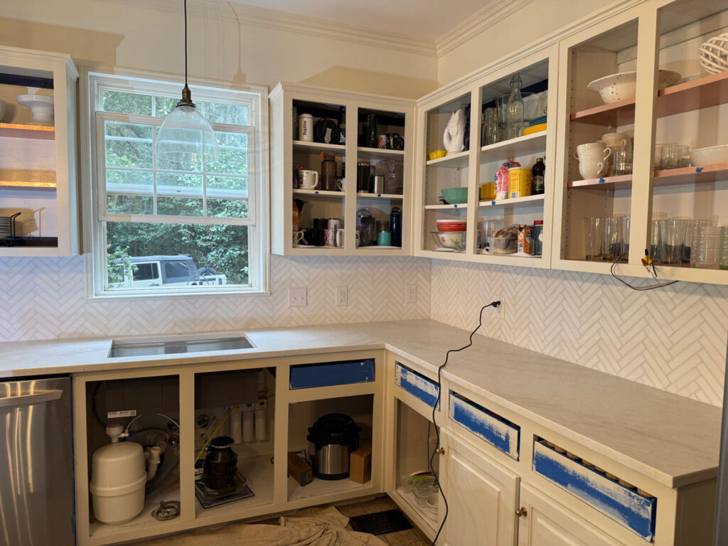 kitchen with cabinet doors removed