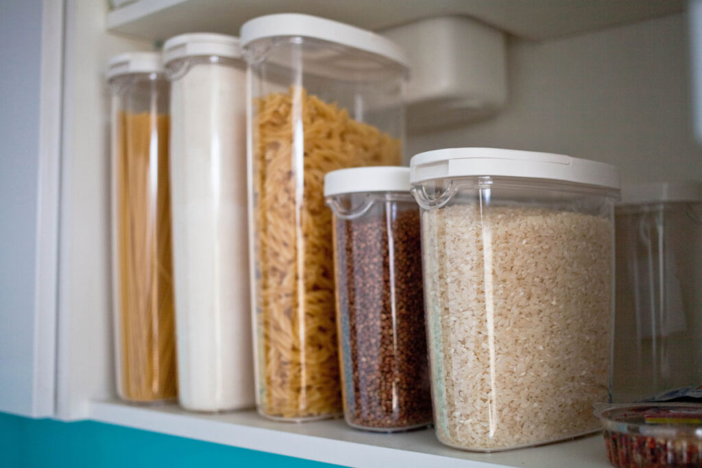 shelf with clear containers of food