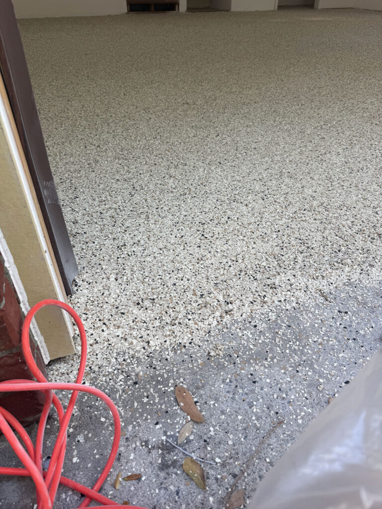 flakes of garage floor coating