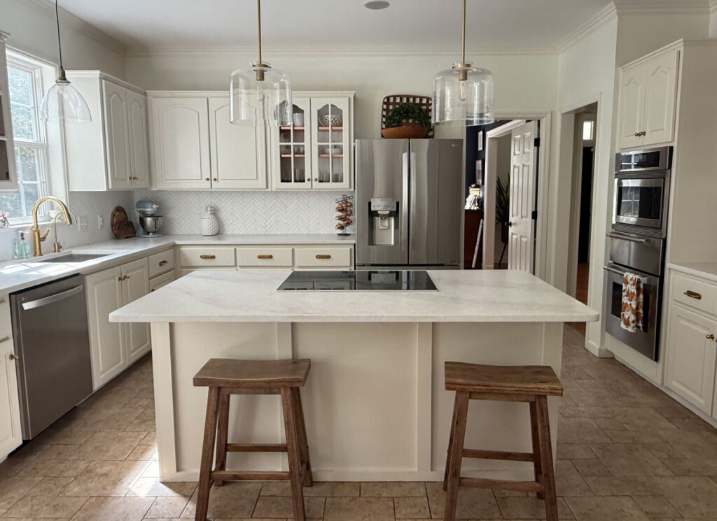 kitchen with ivory cabinets and light quartz counters