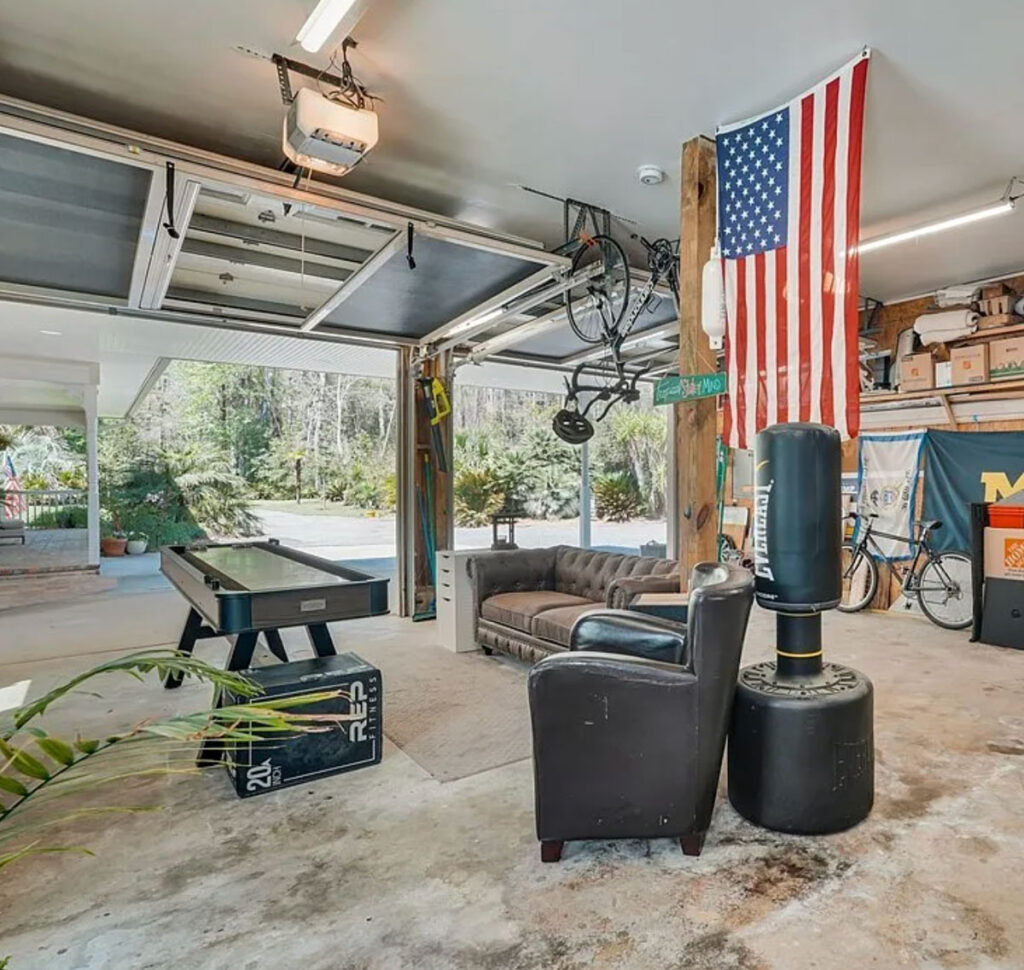 garage man cave with shuffleboard