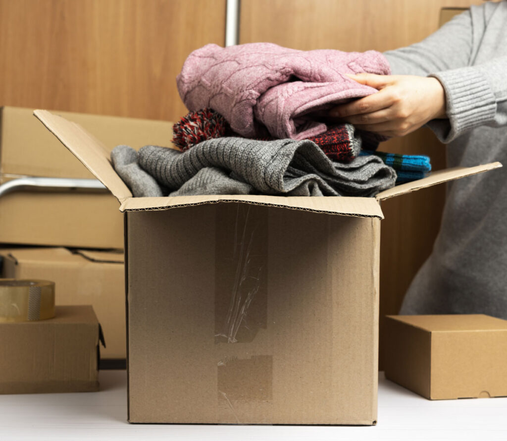 storing sweaters in box