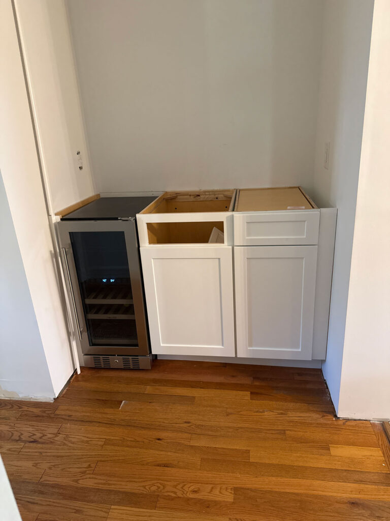 wet bar cabinets being installed