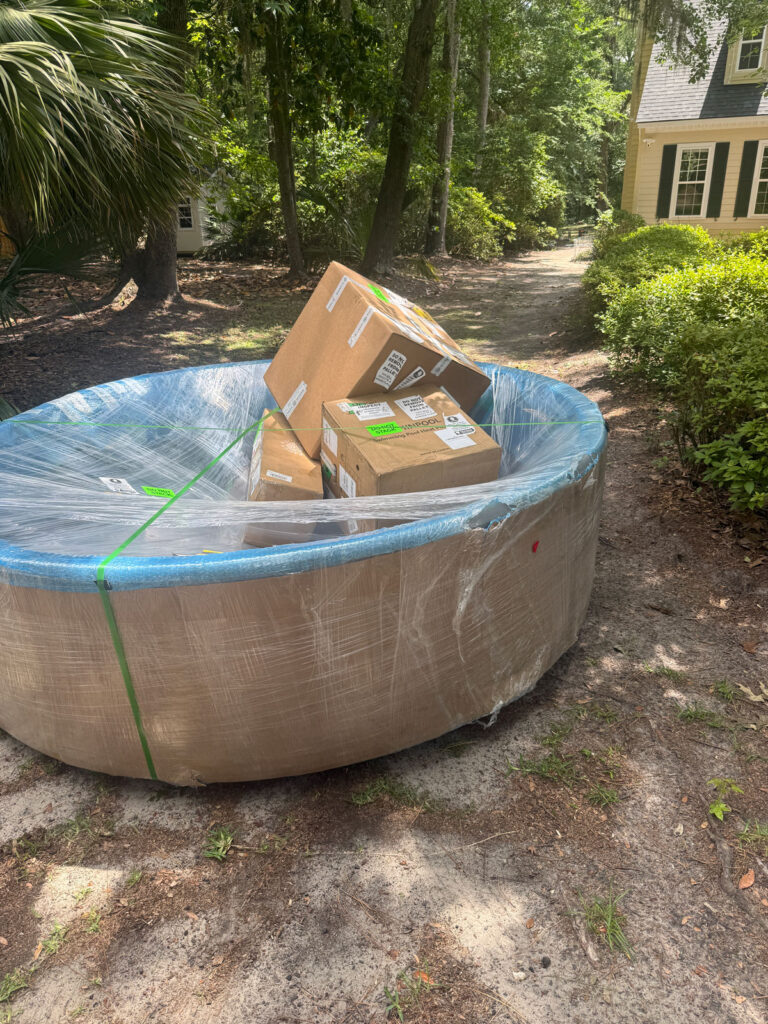 stock tank pool with boxes on top